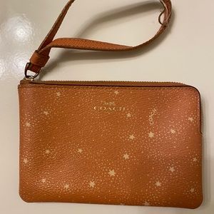 Orange/peach coach wristlet